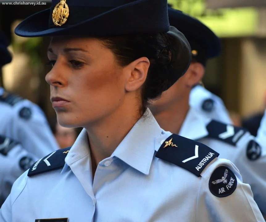 She marched with the particular focus of someone who has practised this many times and is doing it for reasons that matter to her. That is the face worth finding.