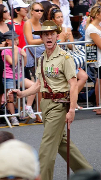 The swagger stick, the slouch hat, the medals — there is a whole grammar to military dress that most of us only read on ANZAC Day.