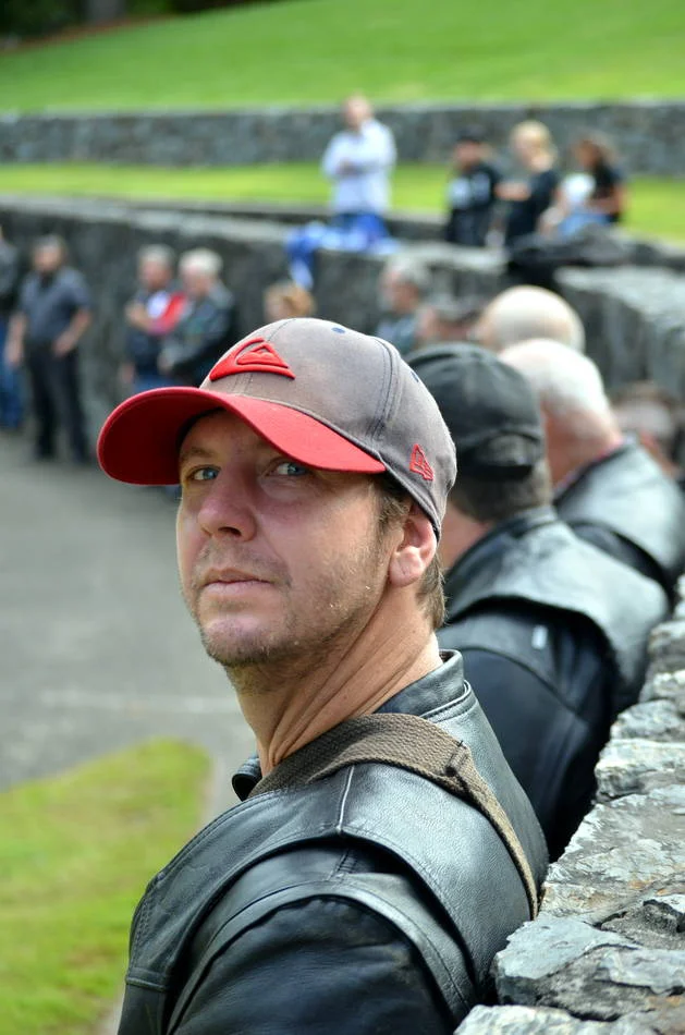 He turned to look back at the crowd behind him. That glance over the shoulder — checking who is there — is one of the most human gestures at any protest.