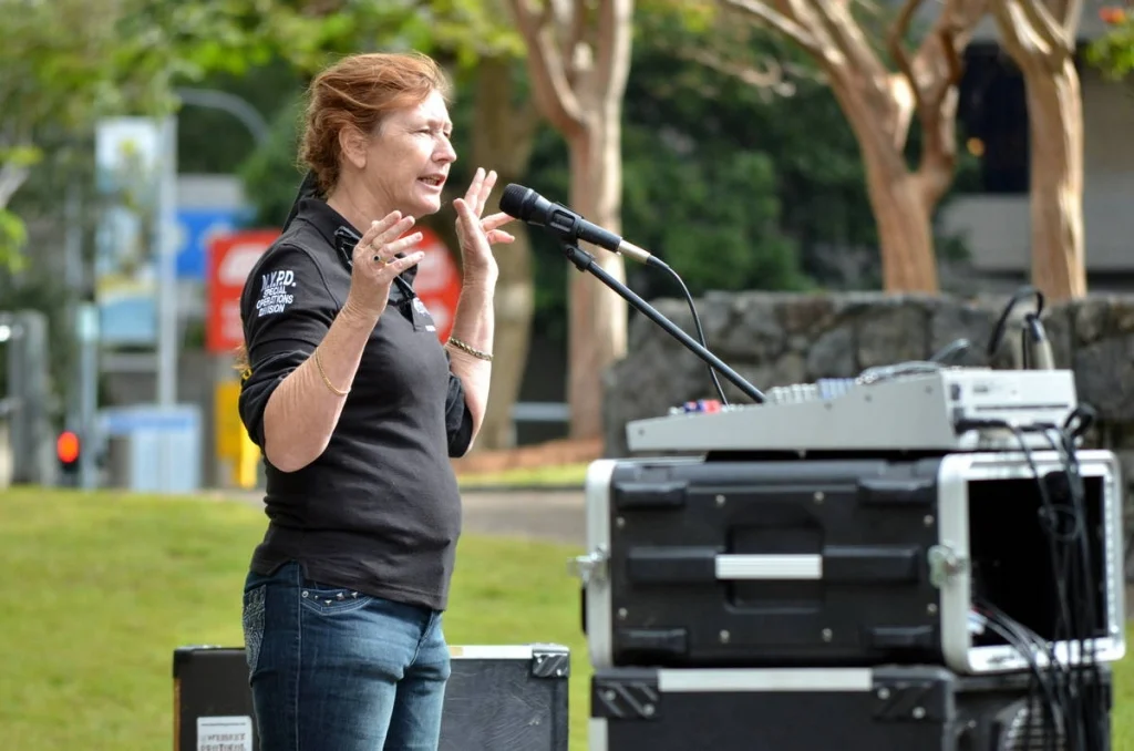 The hands are doing as much of the talking as the voice. At a good rally, the speakers forget the microphone is there.