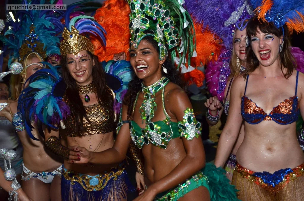 Three dancers, three different expressions of the same joy. The costumes do not require you to manufacture anything — the energy is already there.