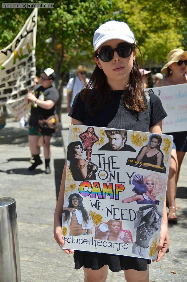 Marching is a physical argument. Bodies in a street say something that words on a screen cannot — and a photograph can hold that argument still long enough to read.
