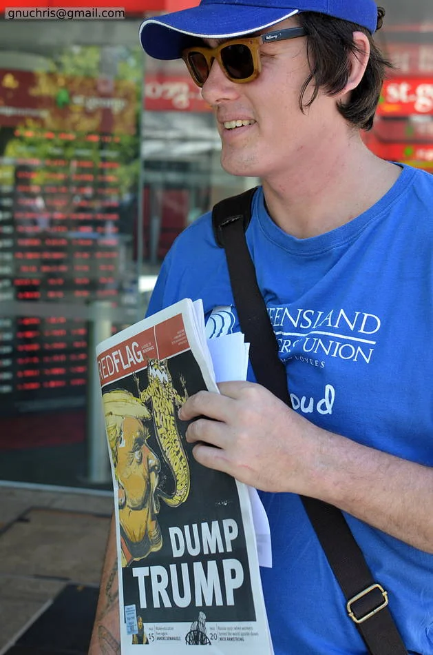 Activism in the street has its own aesthetics — newspapers, hand-lettered signs, earnest faces. I try to honour that rather than aestheticise it.