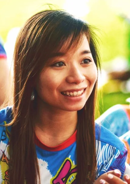 An unselfconscious smile is a gift. You do not direct it. You wait for it and then you are fast.