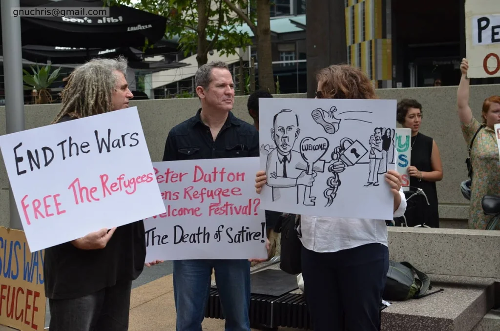 Hand-drawn cartoons at a protest are evidence that someone stayed up late making an argument with a pen. That effort is its own kind of witness.