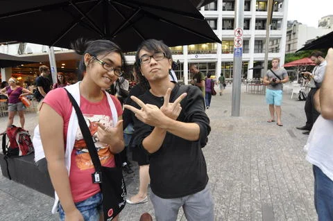 When photographers are the subject, they lose all their natural reluctance. The peace signs appear immediately.